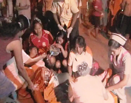 The medical volunteers and neighbours made sure the mother and child were okay.